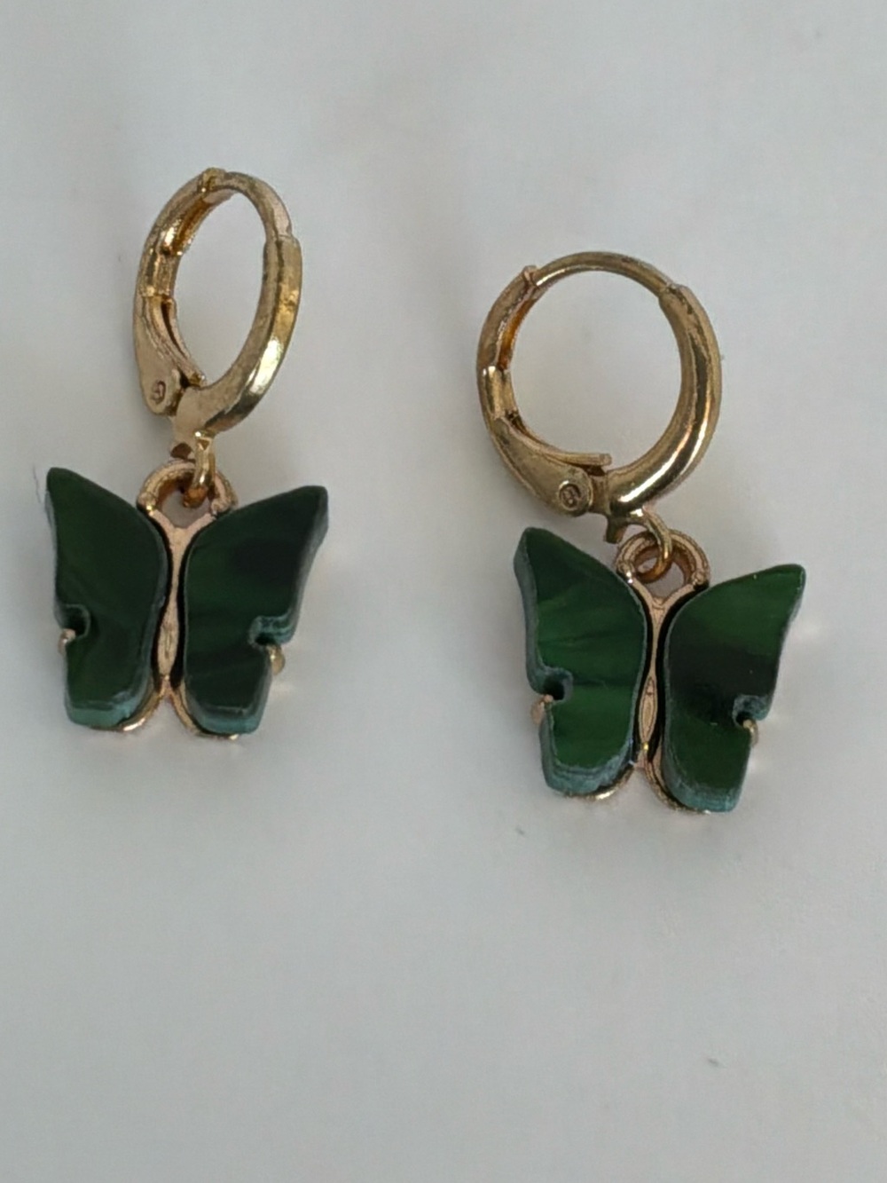 Gold Huggy Hoop Earrings with Green Butterfly Charms - Women's Jewelry